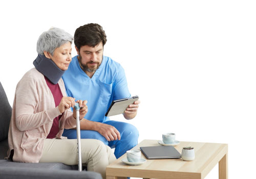 male-doctor-uniform-sitting-sofa-together-with-senior-woman-he-using-digital-tablet-telling-about-her-diagnosis